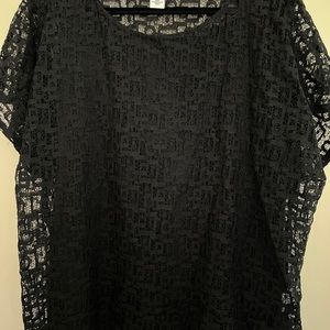 NWOT (never worn) Women’s Black Cut Out Top with Attached Tank